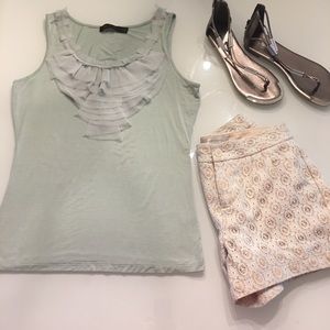 The limited Medium light green ruffle top tank